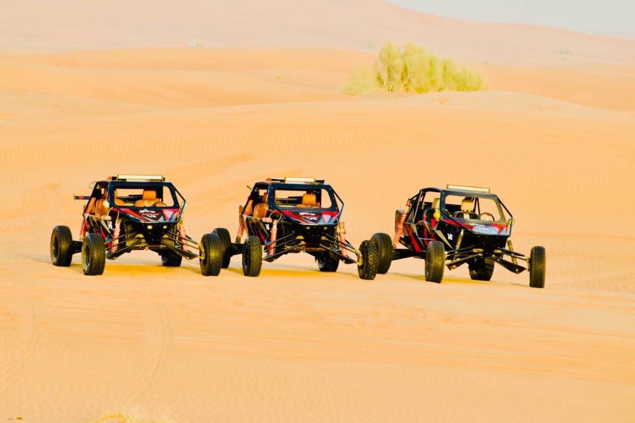 Convoy of desert buggies